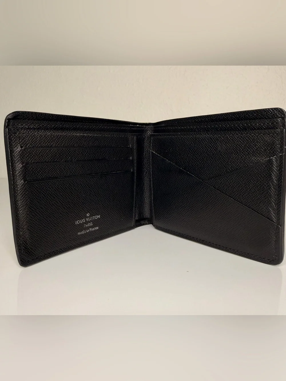 Authentic Louis Vuitton Black Epi Leather Bi-Fold Wallet